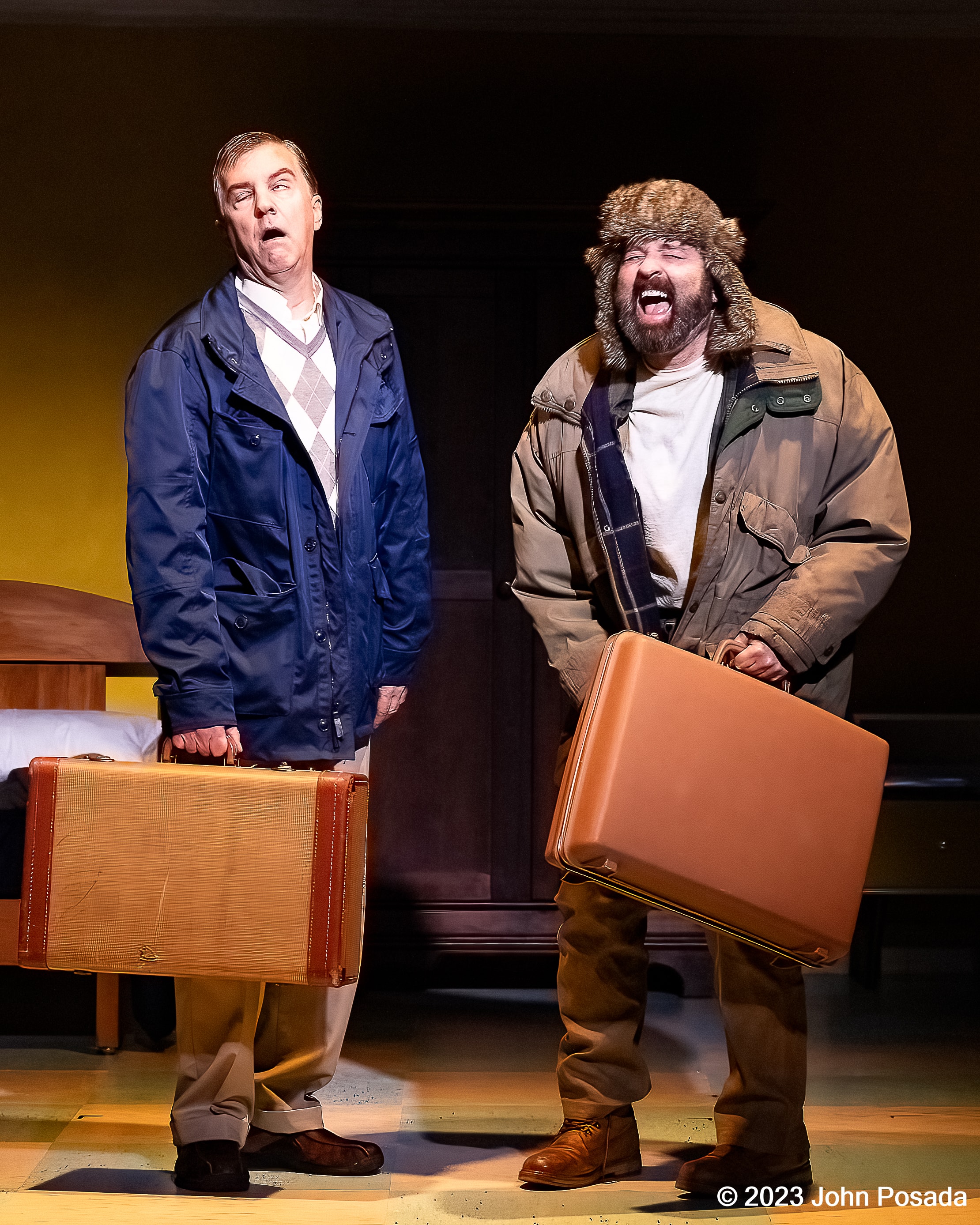 Elling 2023 — two men holding suitcases on stage