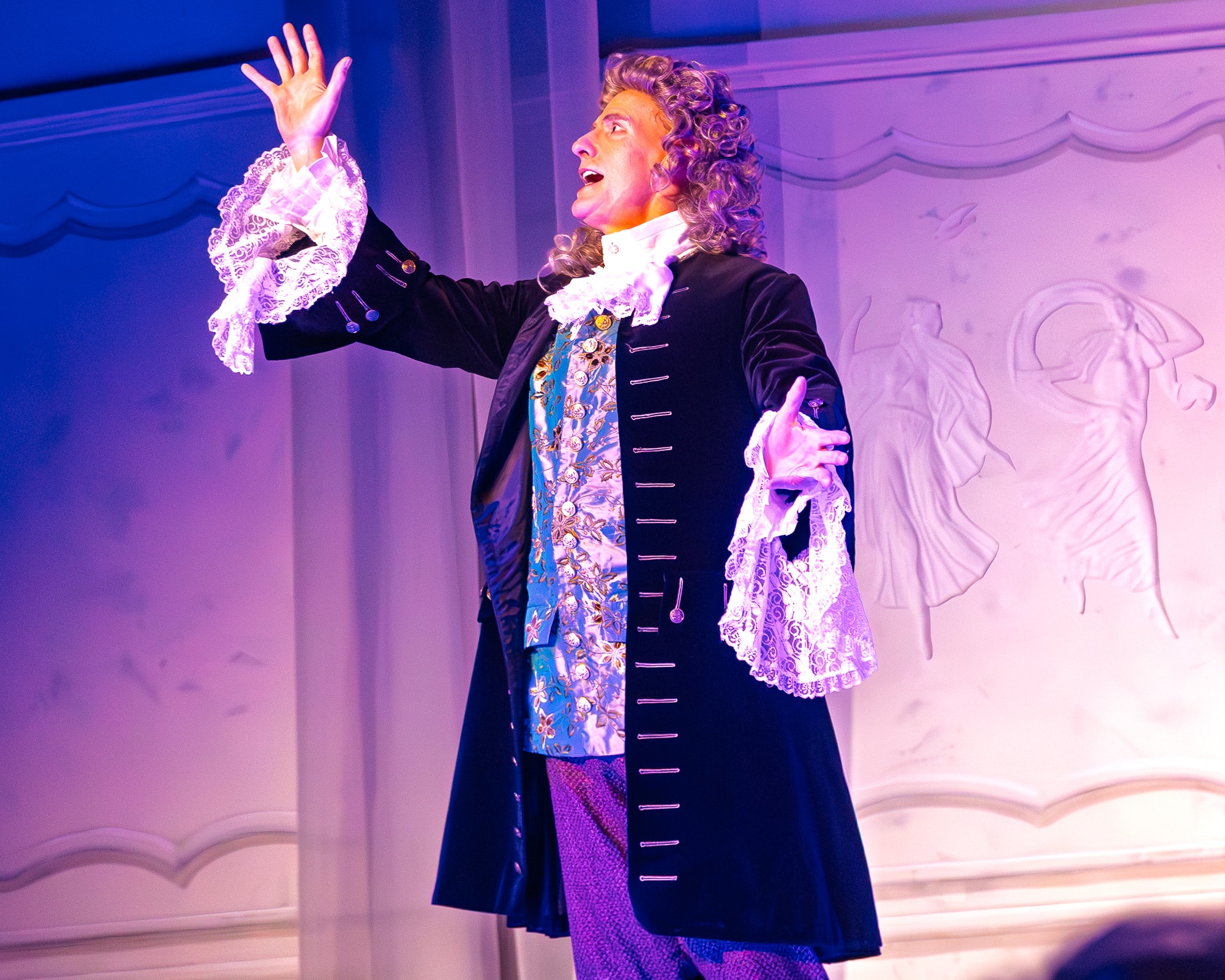 Legacy of Light 2025 — performer in ornate period costume on stage