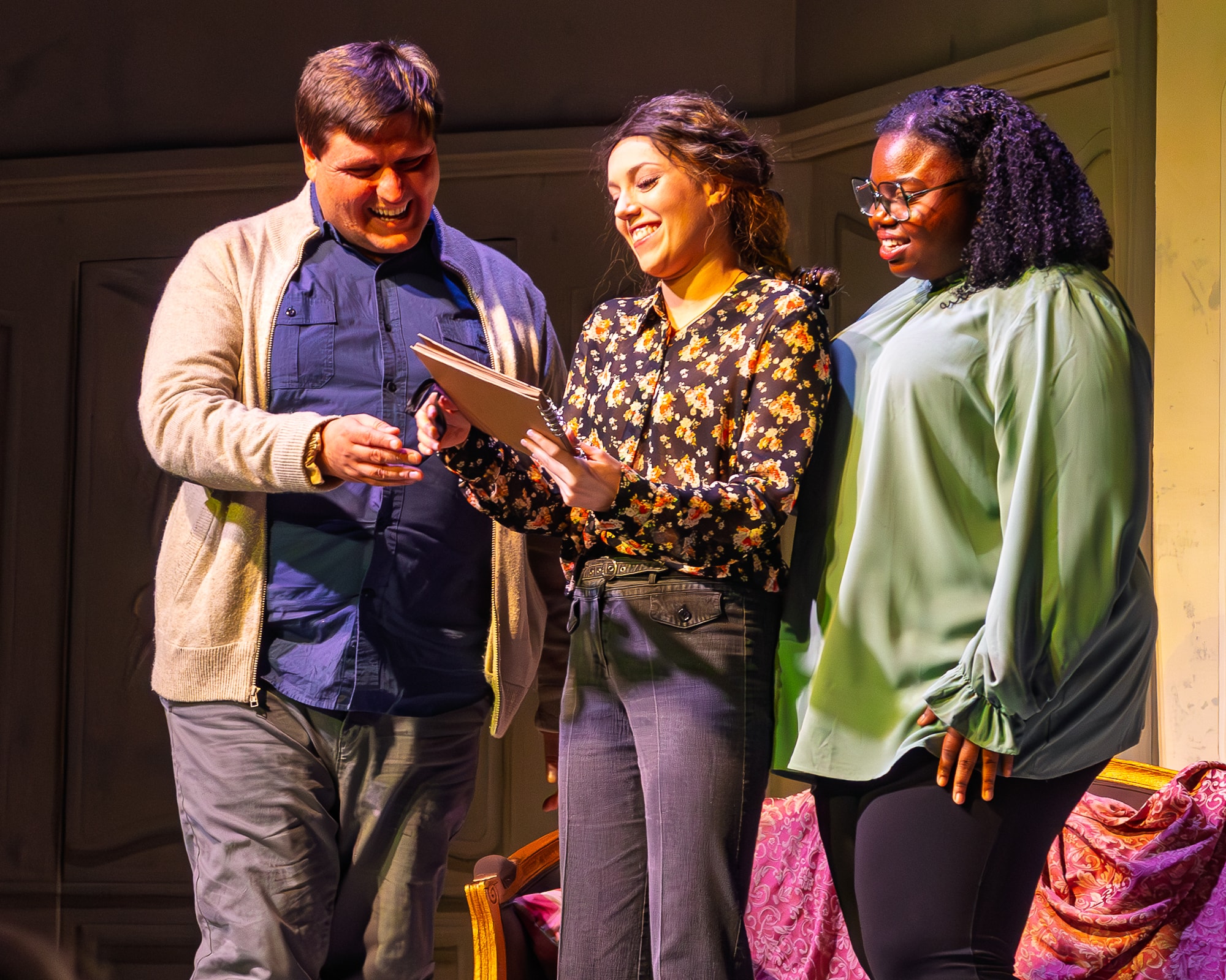 Legacy of Light 2025 — three people reading script on stage
